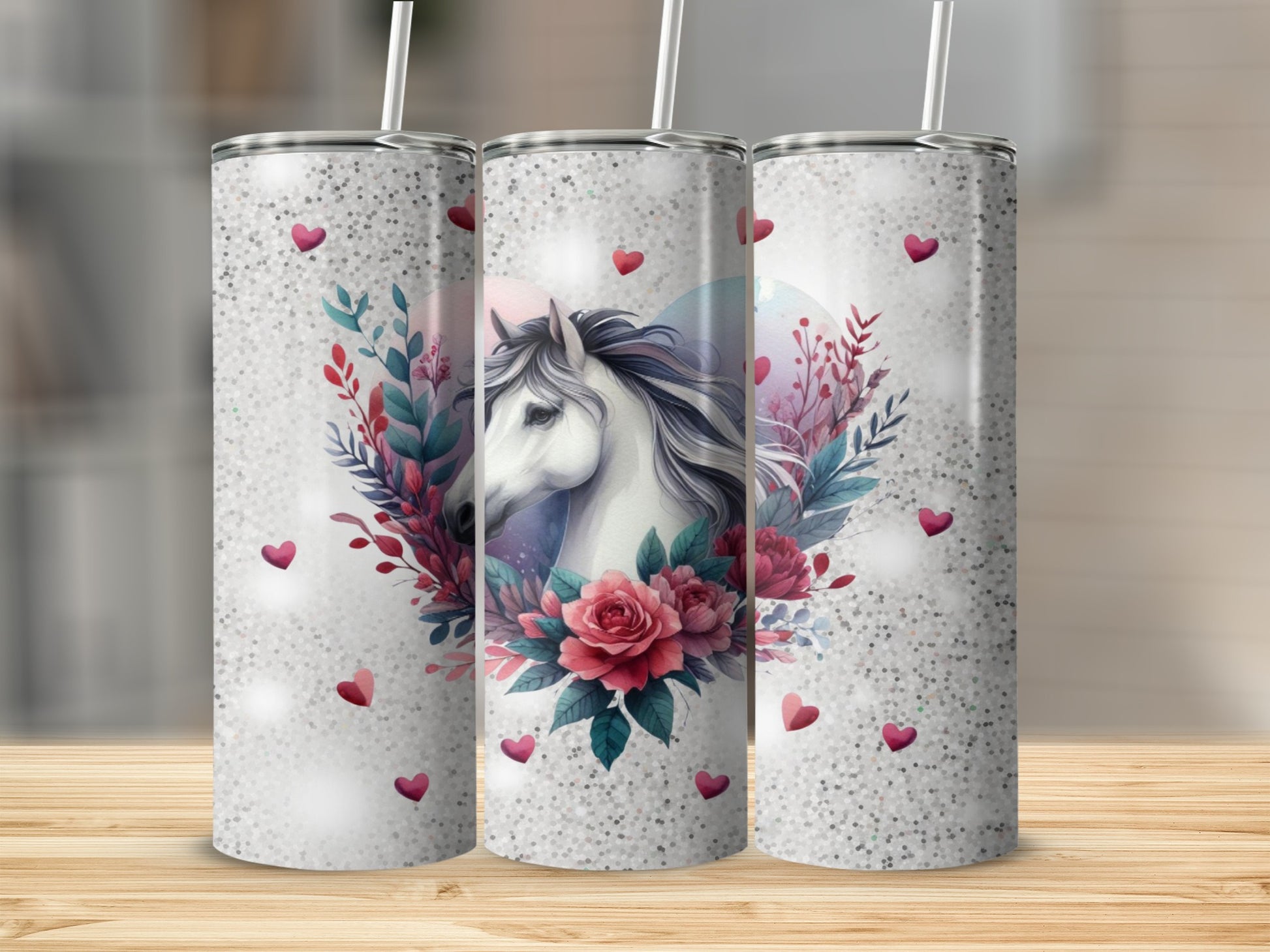 White unicorn with flowers and hearts on a glittery tumbler.