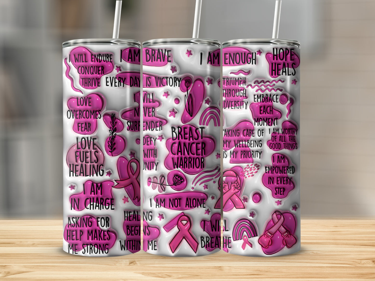 Pink tumbler with breast cancer awareness text and ribbon graphics.