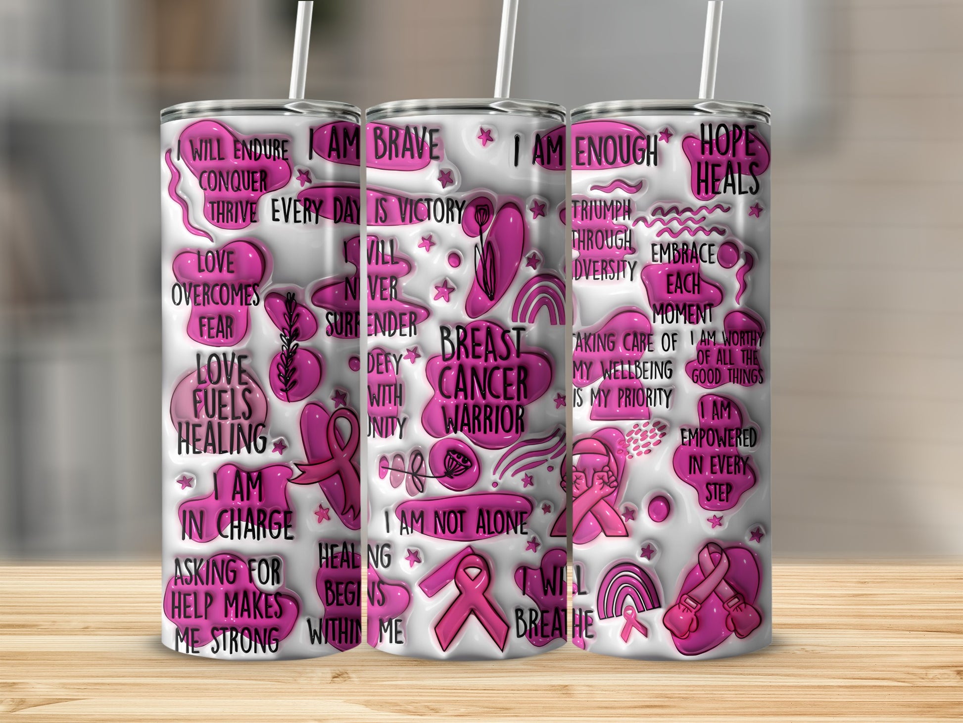 Pink tumbler with breast cancer awareness text and ribbon graphics.