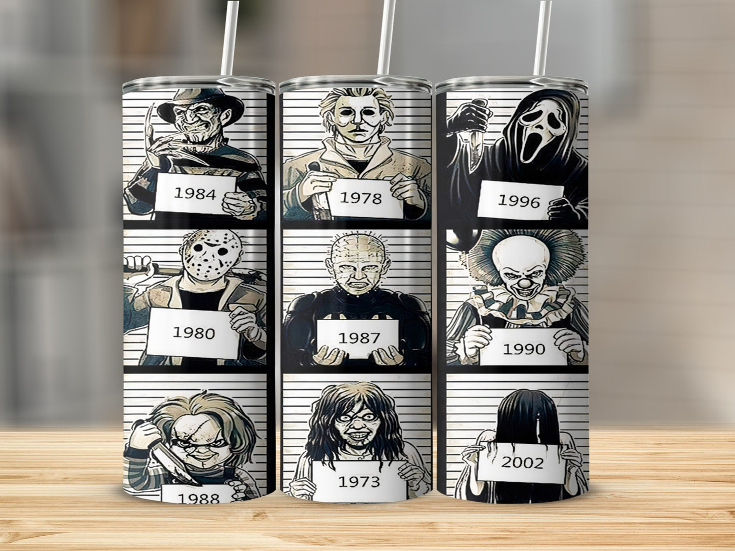 Tumbler with mugshot-style horror movie villains including Freddy, Michael Myers, Ghostface, and Pennywise.