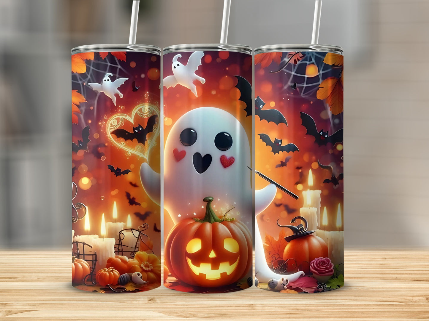 Halloween tumblers with ghosts, bats, pumpkins, candles, and autumn leaves.
