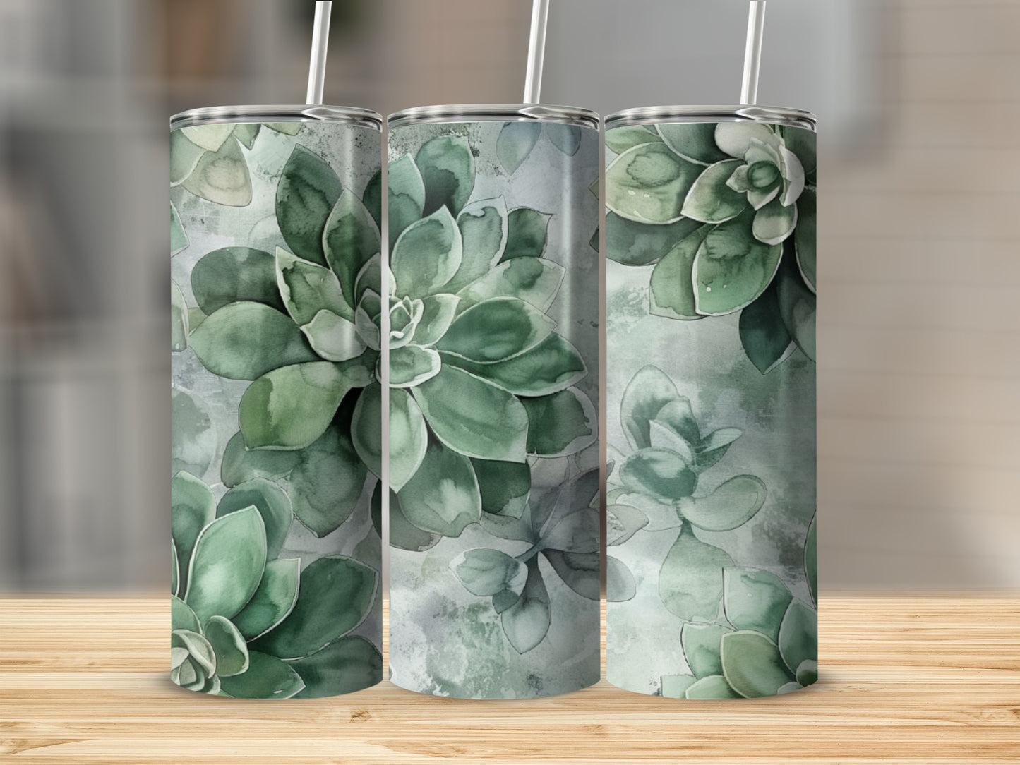 Three tumblers with a watercolor succulent pattern in shades of green.