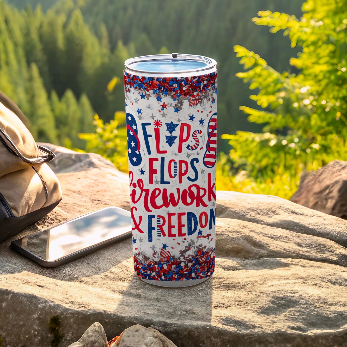 Red, white, and blue tumbler with "flips flops firework & freedom" text.