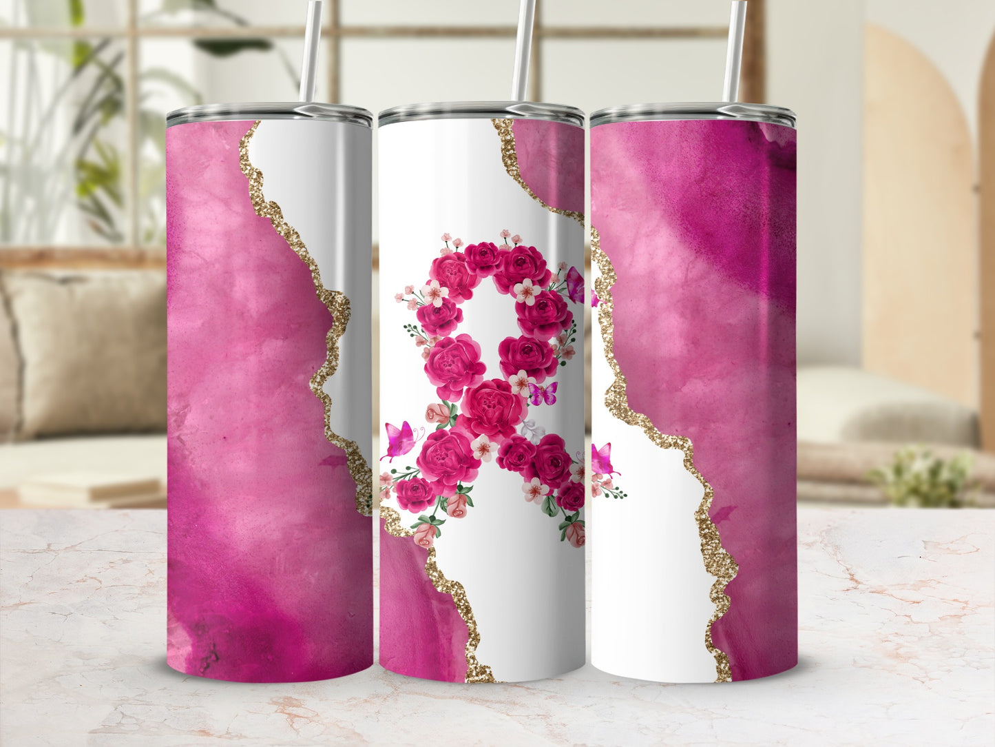 Pink watercolor tumbler with a floral ribbon and butterfly design.