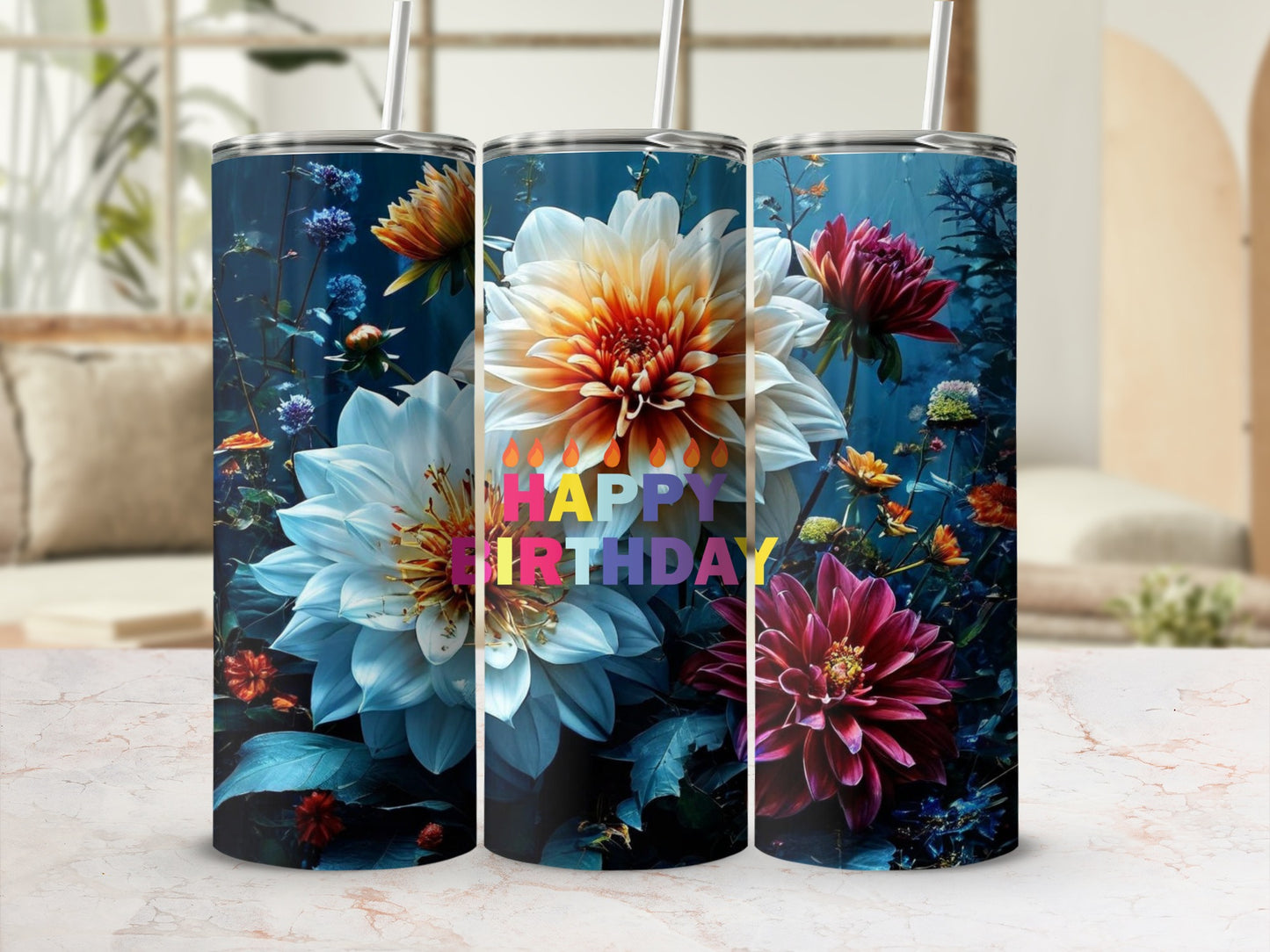 Three tumblers with vibrant floral designs and "Happy Birthday" text.