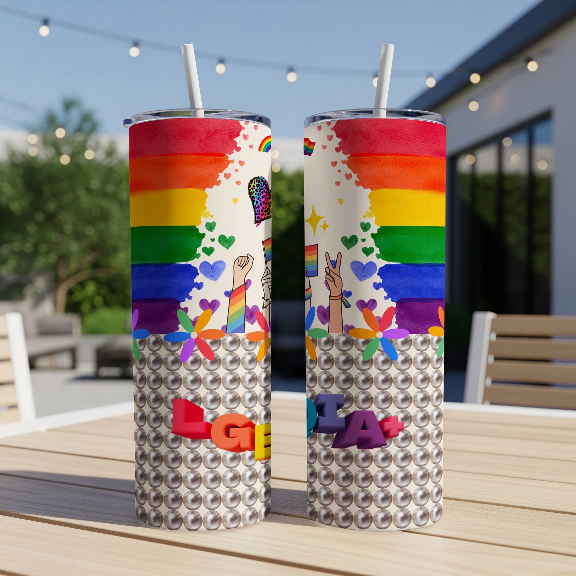 Two tumblers with rainbow and heart design, "LOVE IS" text.