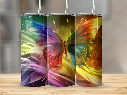 Three tumblers with colorful butterfly designs, each with a straw.
