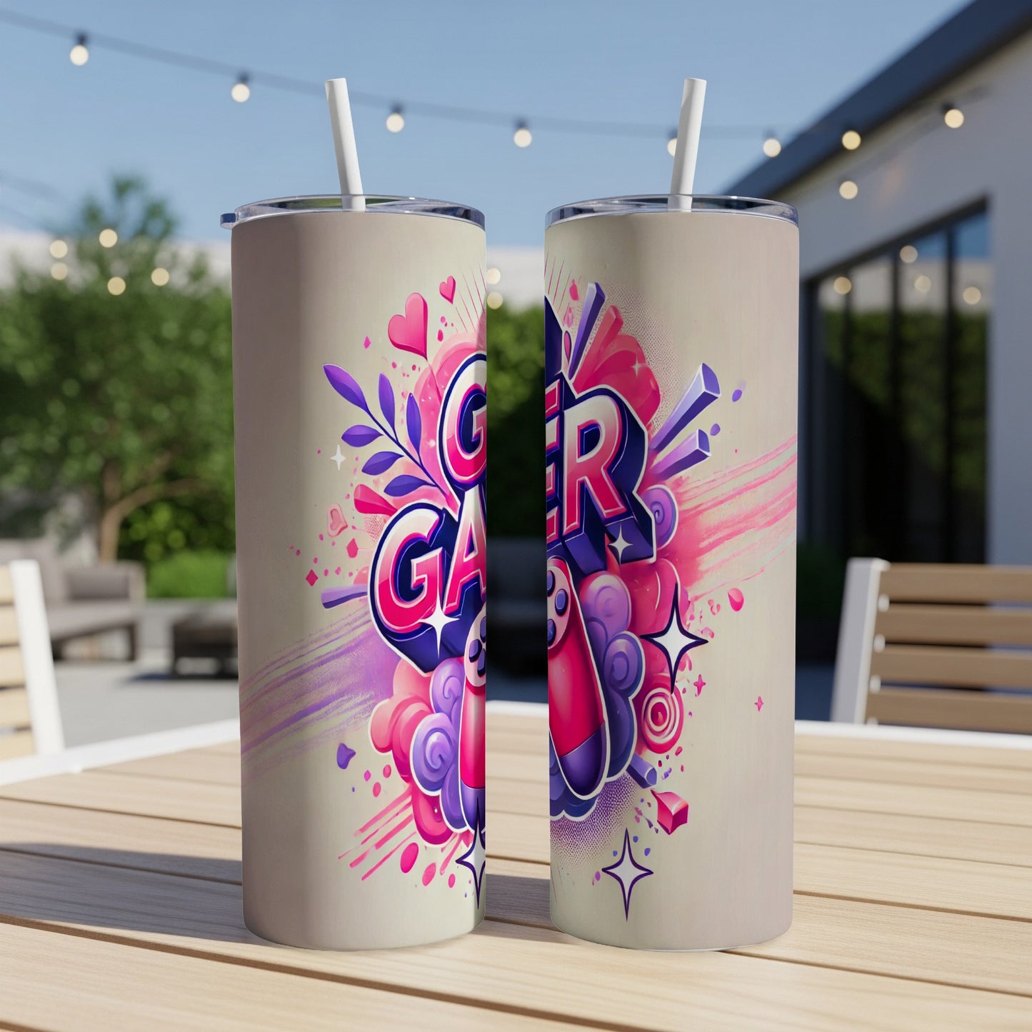 "Gamer" text art with vibrant pink, purple, and blue accents on a tumbler.