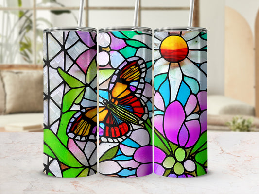 Three stained glass tumblers with floral and butterfly designs.