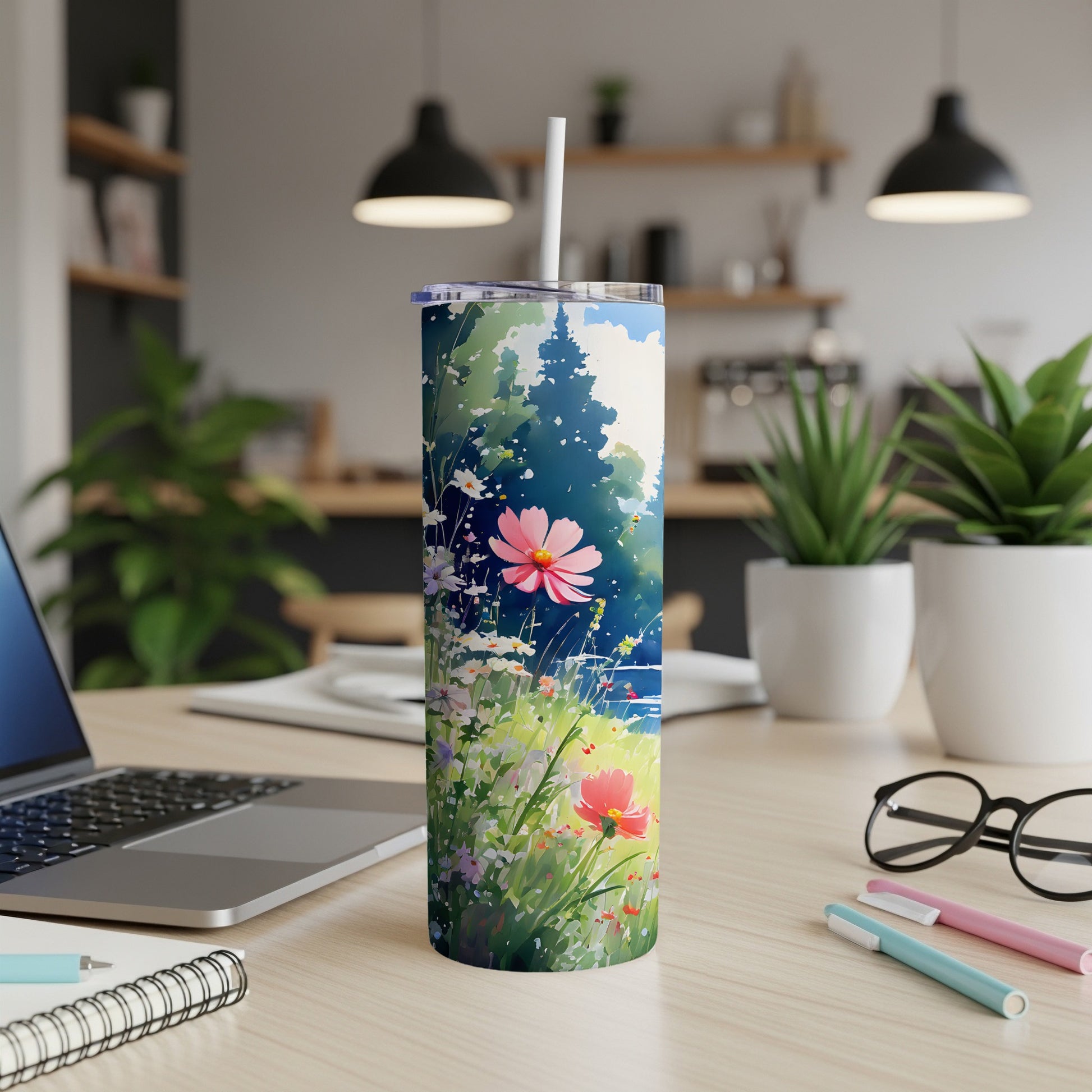 Tall tumbler with a floral meadow watercolor design.