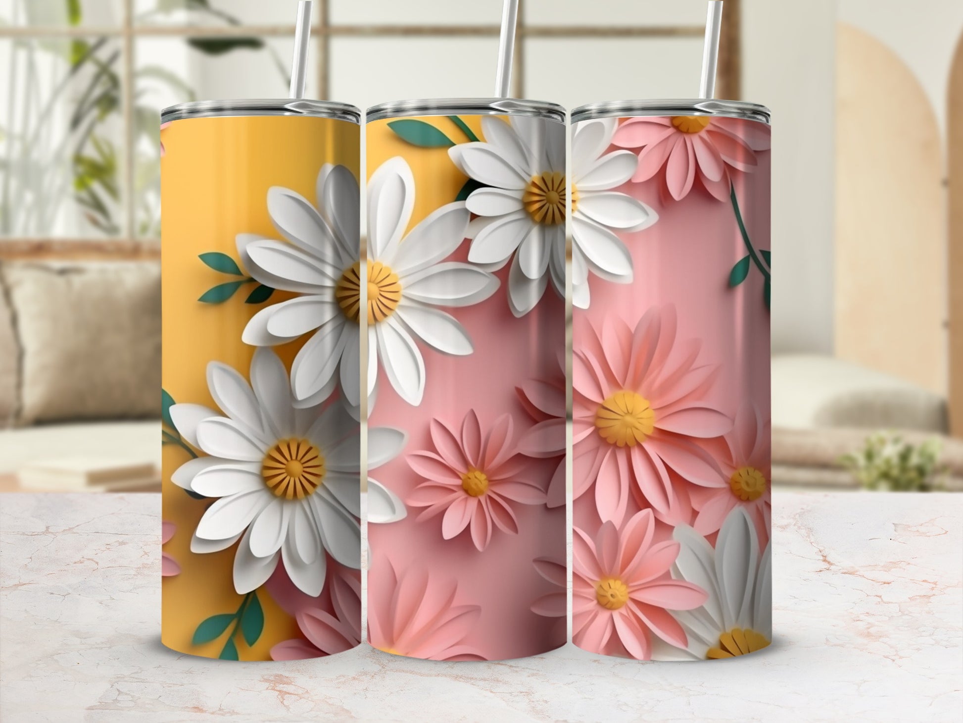 Three tumblers with white and pink daisy floral designs.