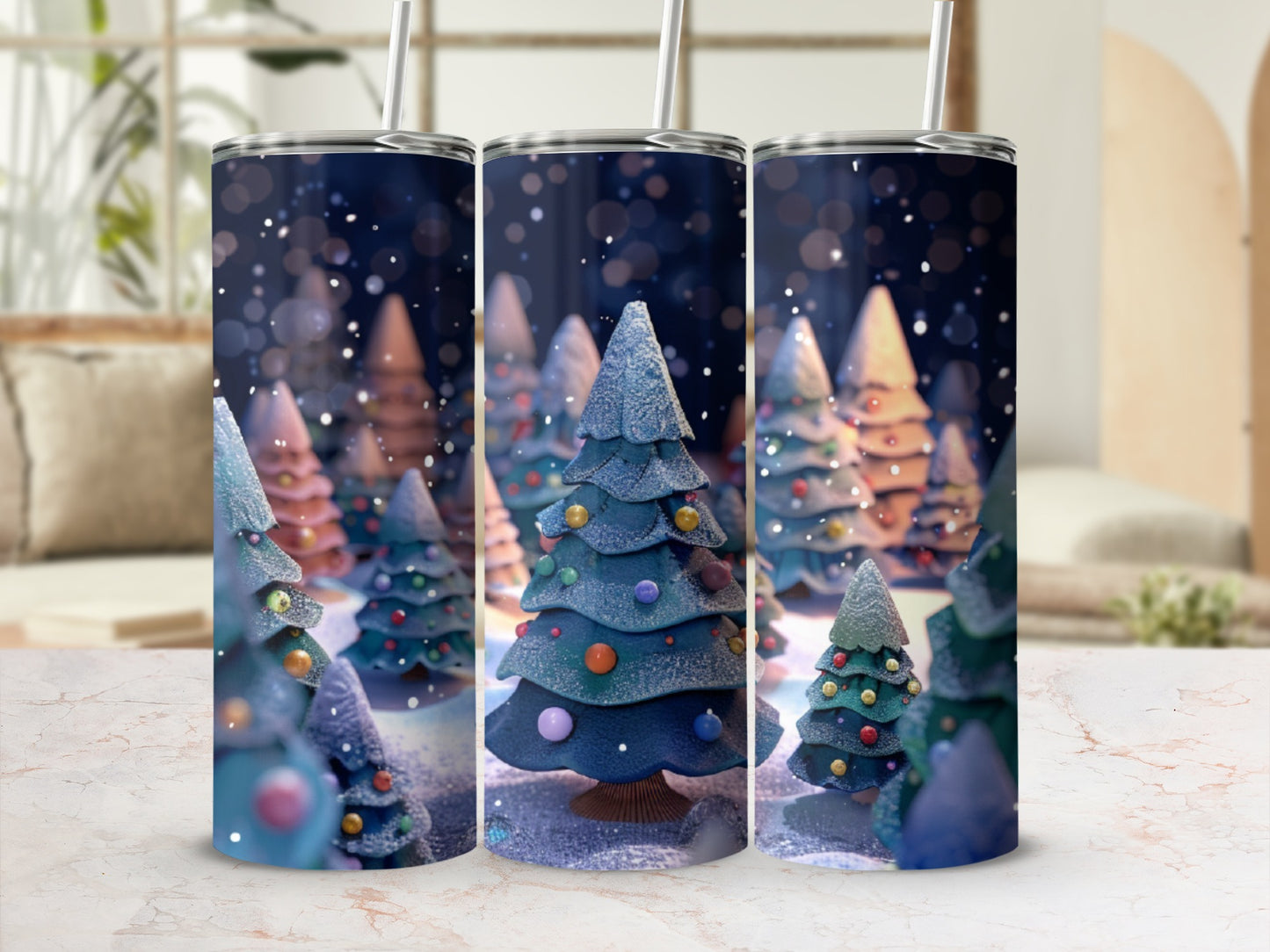 Three tumblers with a festive, snow-covered Christmas tree design.