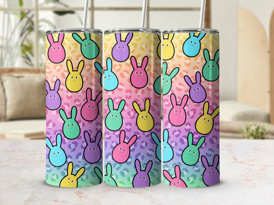 Tumbler with colorful bunny pattern and leopard print accents.