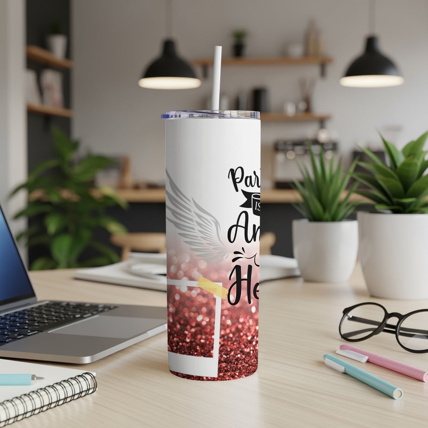 White tumbler with glitter and text "Paris is Always a Good Idea".