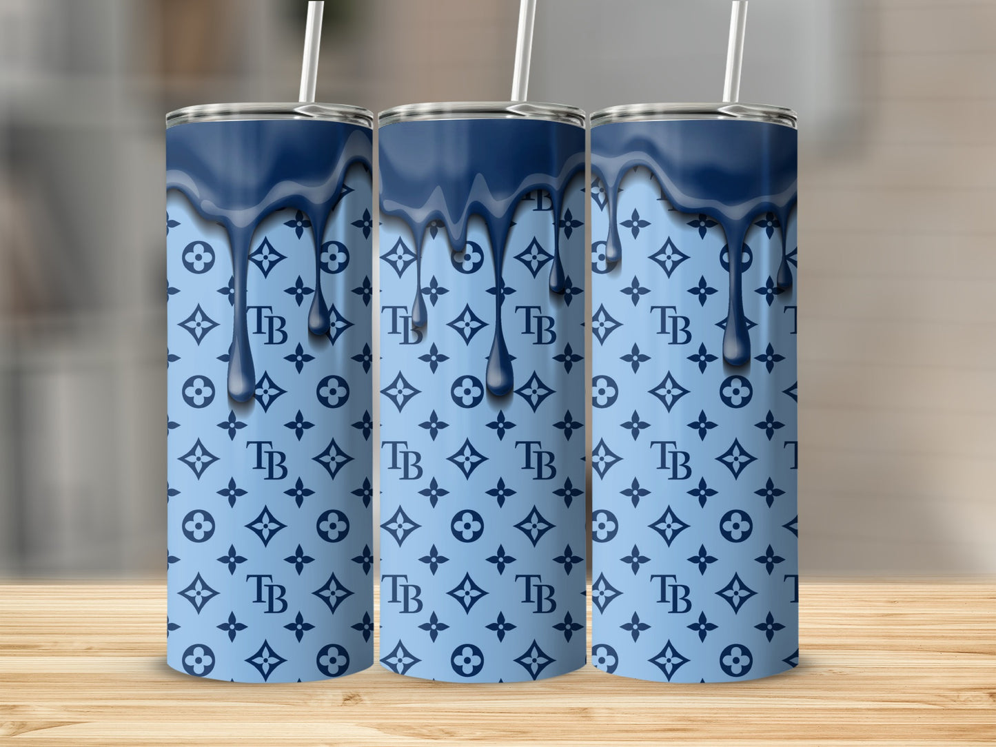 TB Logo Design In Light Blue And Navy Blue Tumblers