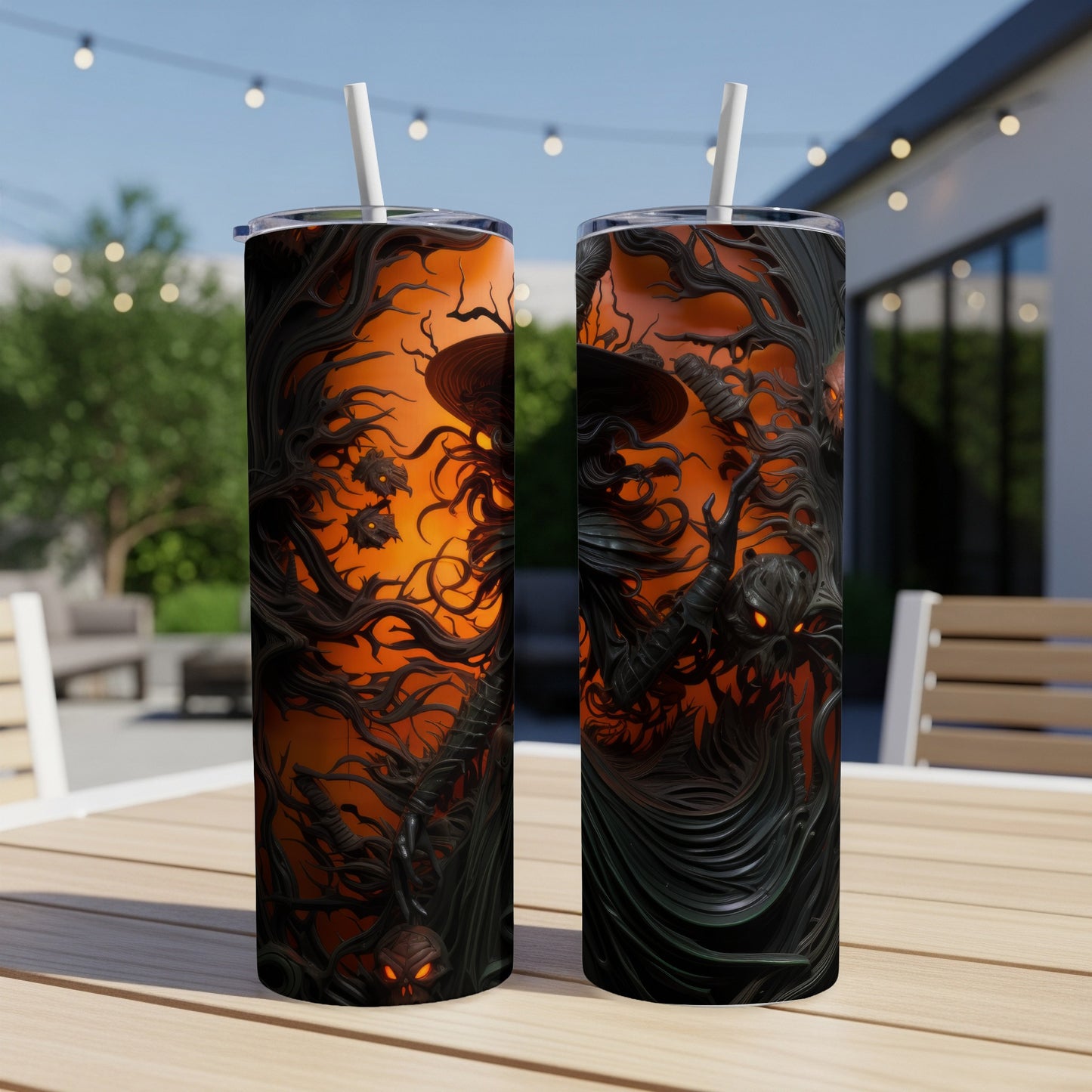 Two Halloween-themed tumblers with spooky witch and skull designs.