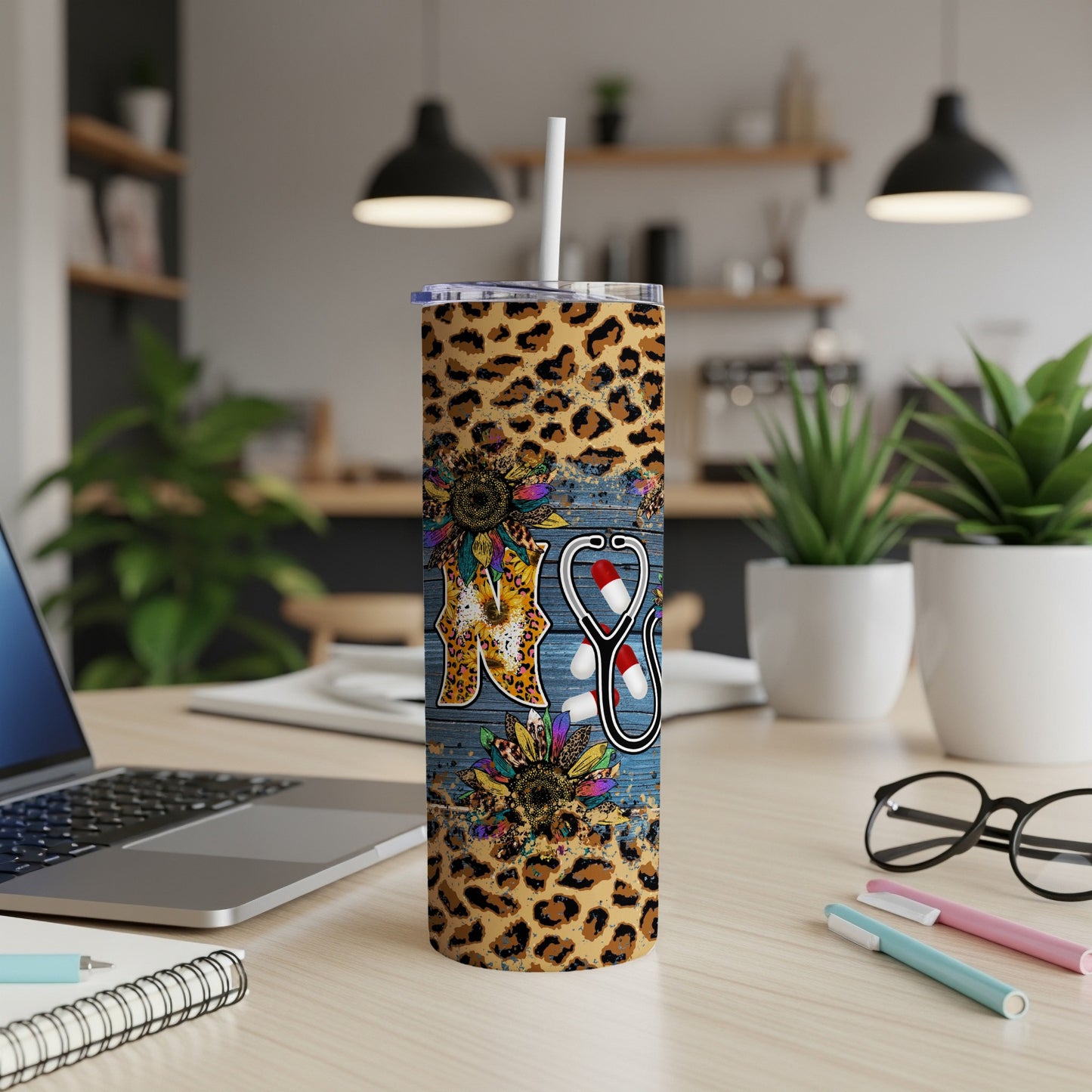 Leopard print and sunflower tumbler with stethoscope and "RN" design.