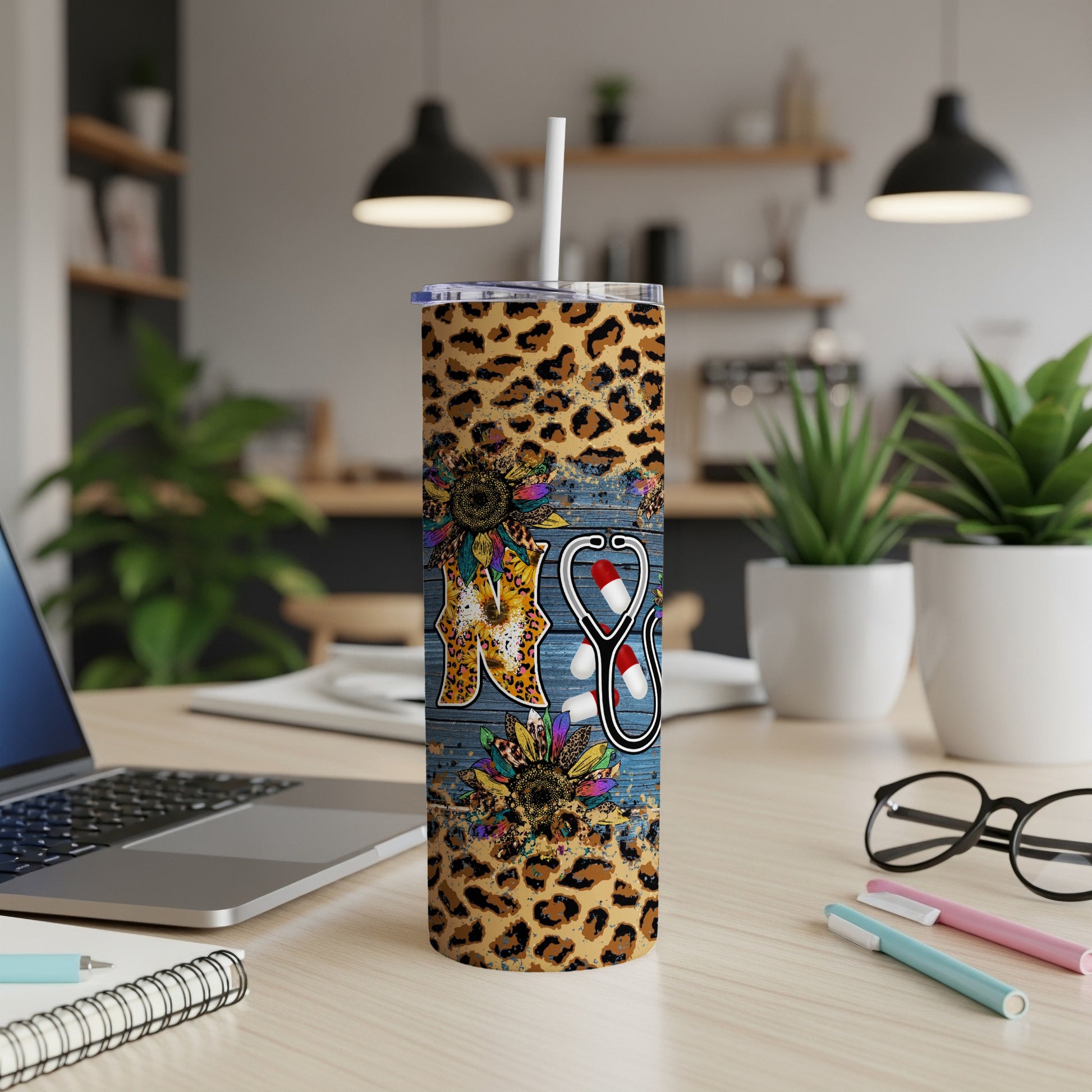 Leopard print and sunflower tumbler with stethoscope and "RN" design.