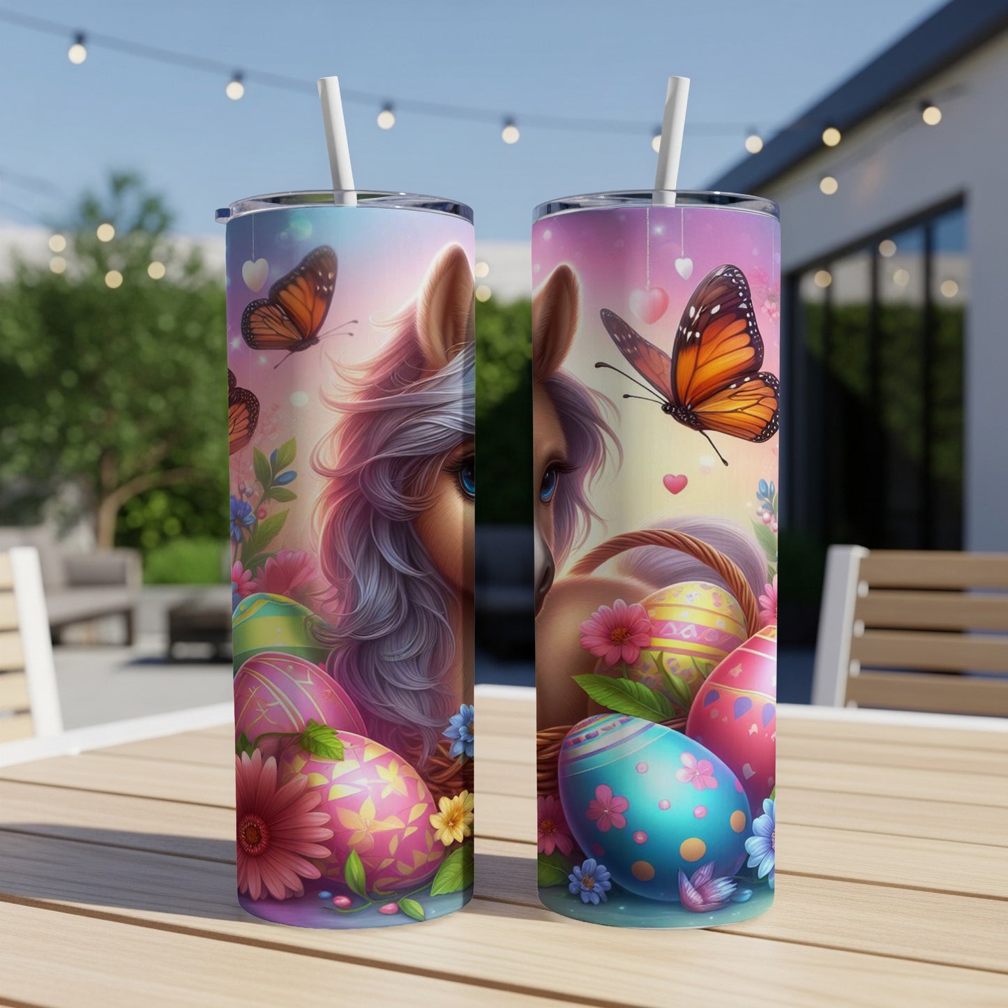 Two unicorn tumblers with Easter eggs and butterflies.