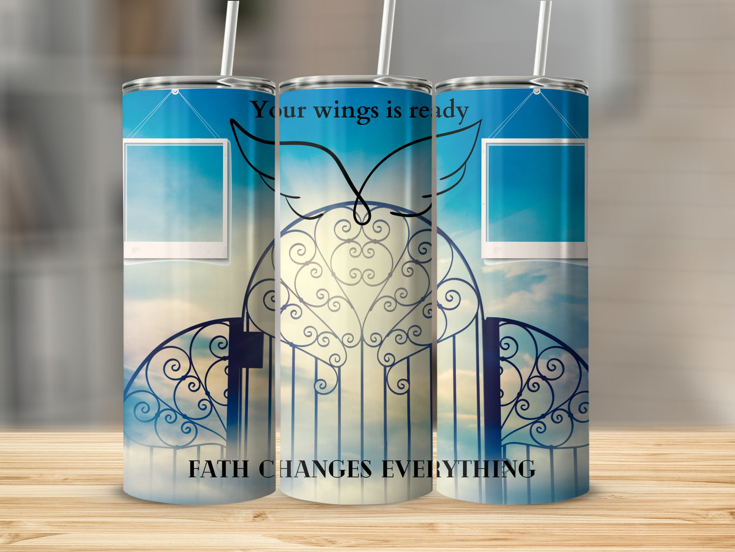 Tumbler with blue sky, gates, wings, and text "Your wings is ready".