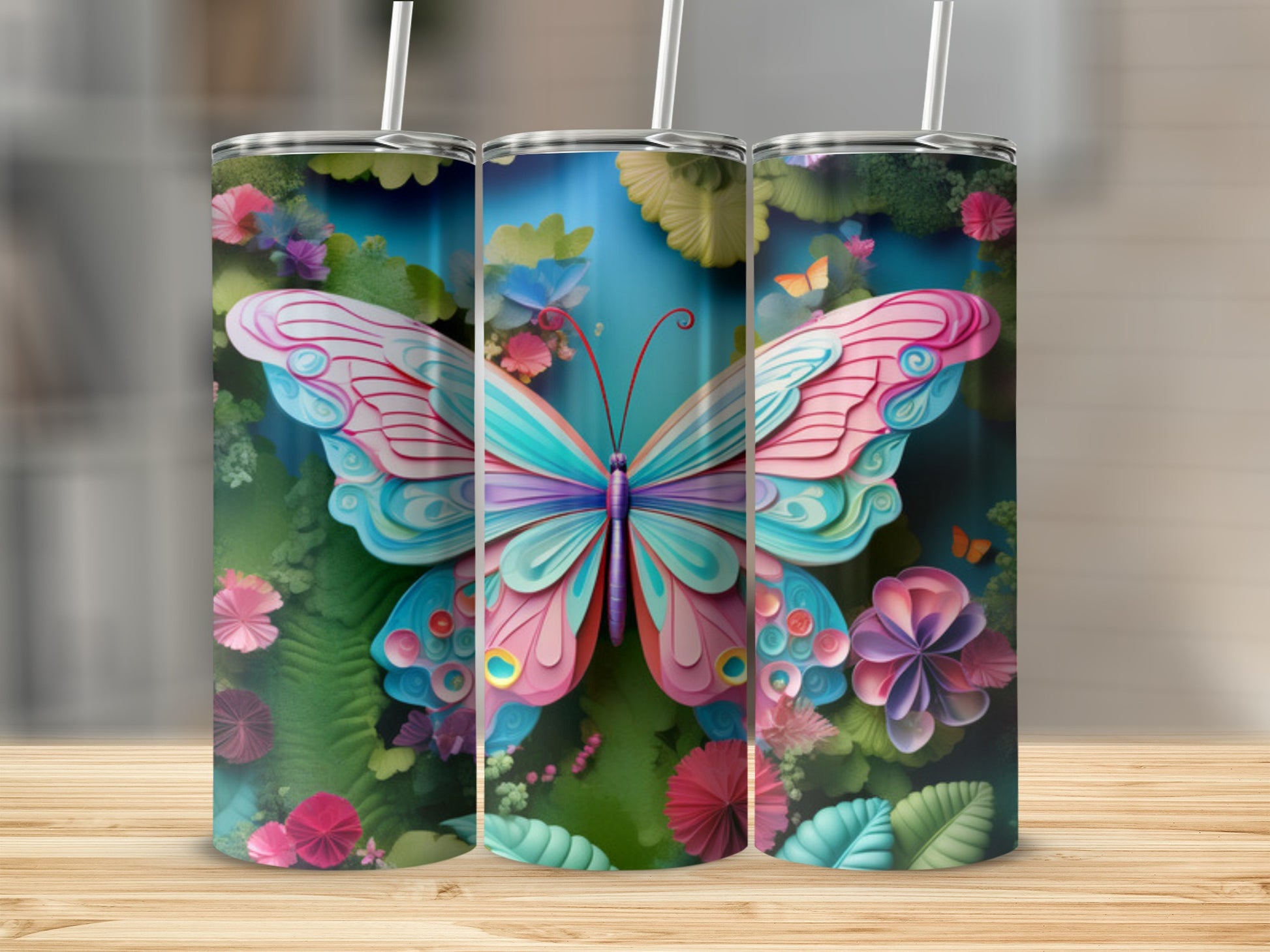 Three tumblers with a large butterfly and floral design.