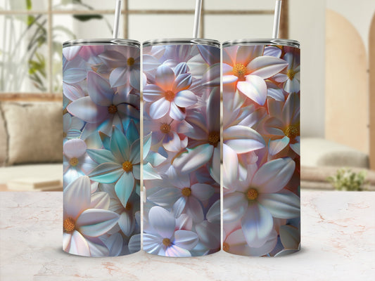 Three tumblers with a floral design in pastel colors.