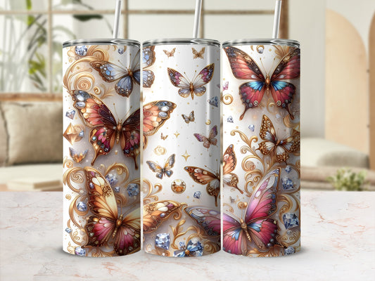 Tall tumbler with iridescent butterflies and jewels on a blurred background.