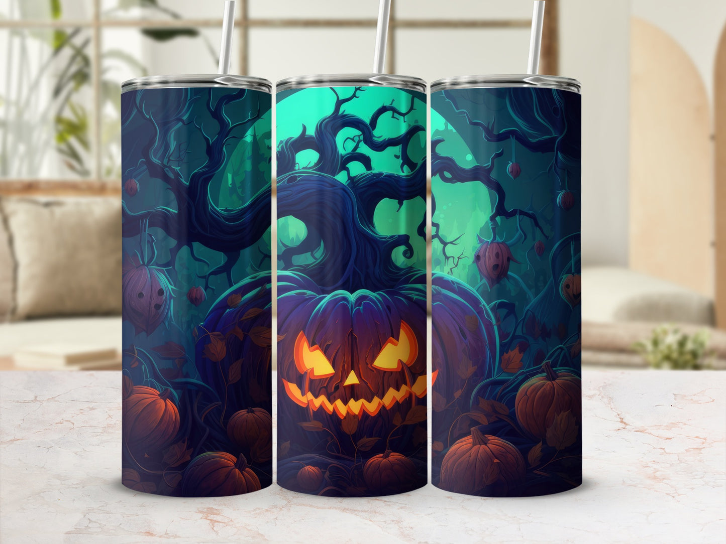 Halloween themed tumblers featuring a jack-o'-lantern and spooky trees.