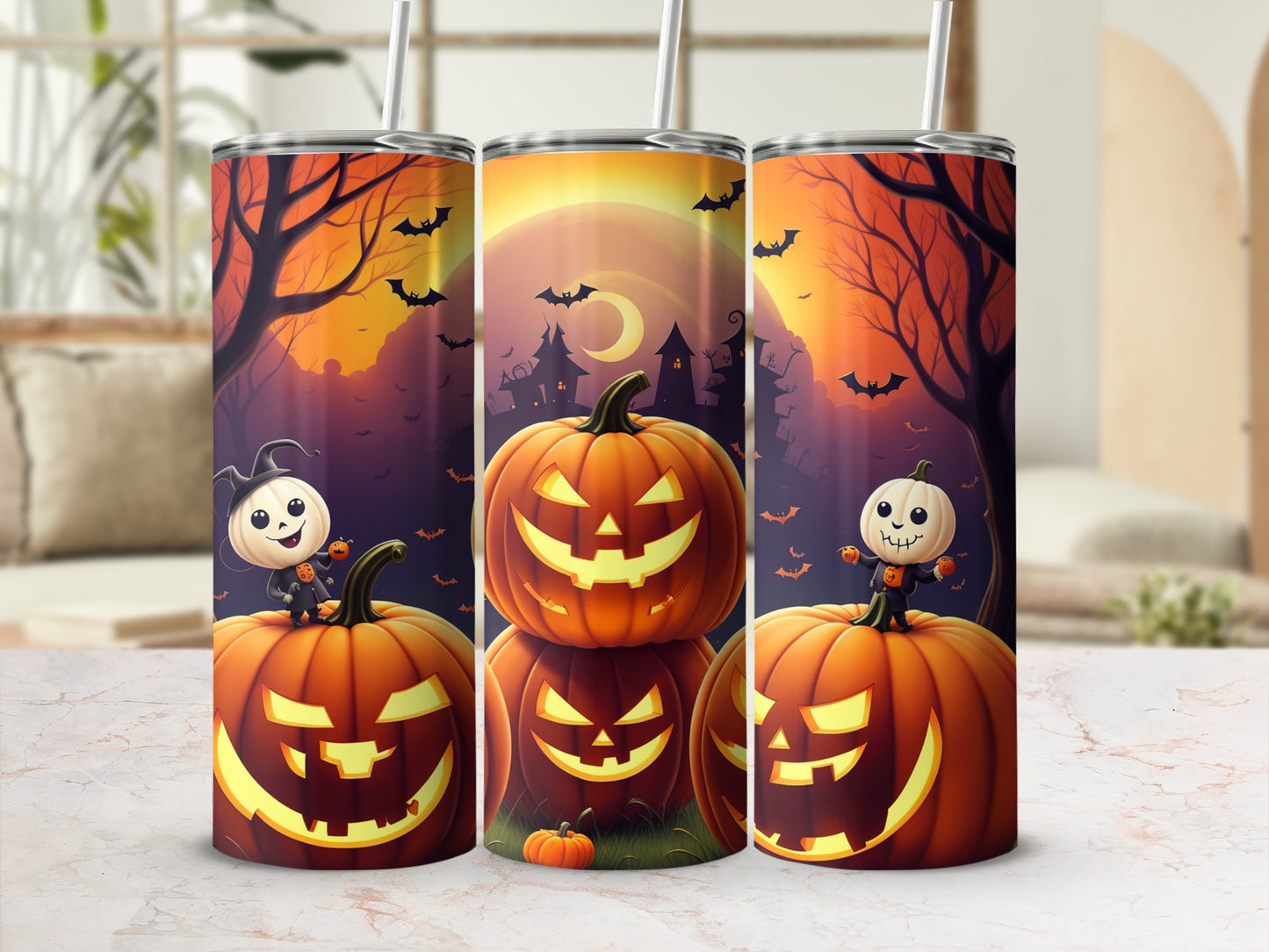 Three Halloween themed tumblers with jack-o'-lanterns and bats on a sunset background.