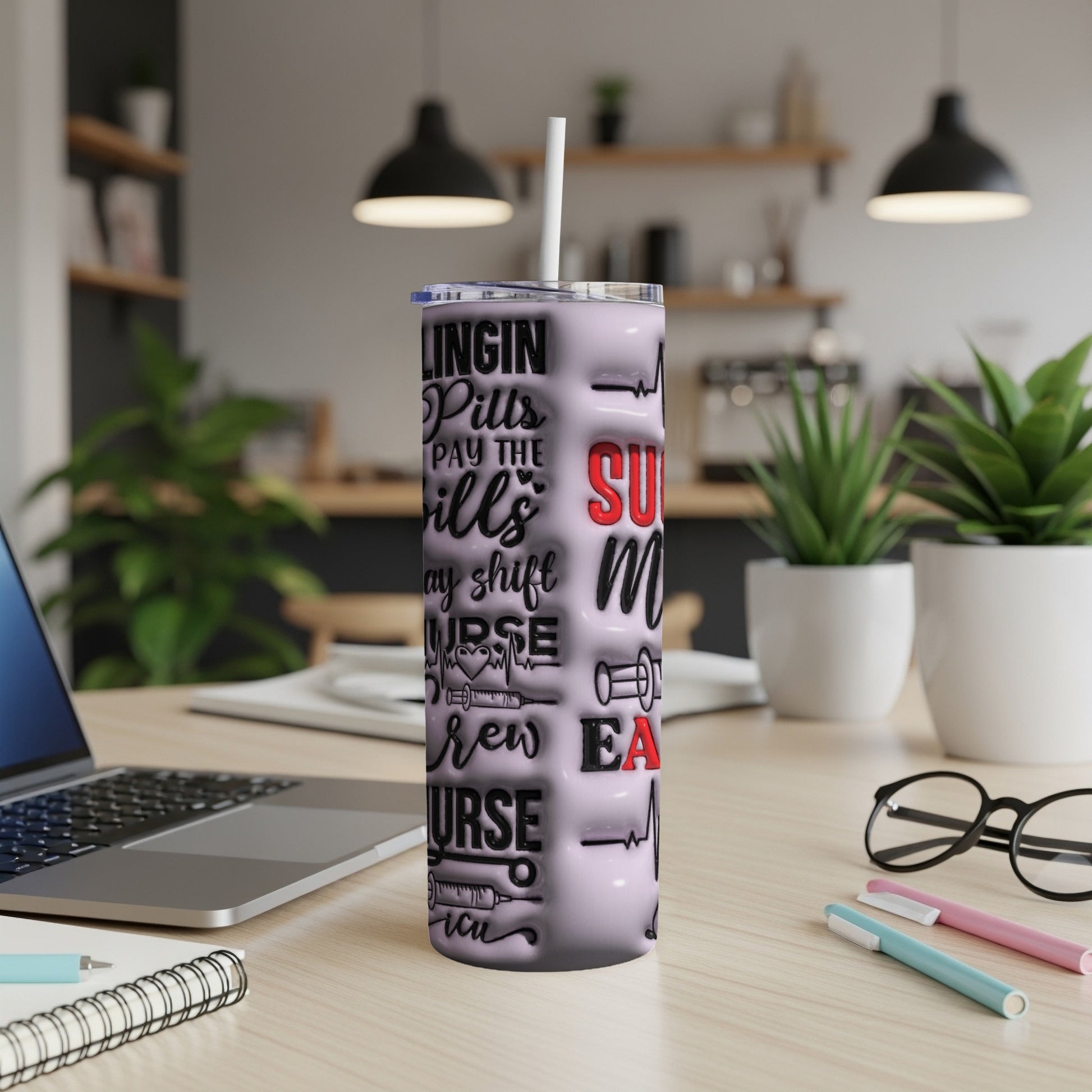 Tumbler with medical and nursing-themed text and graphics.