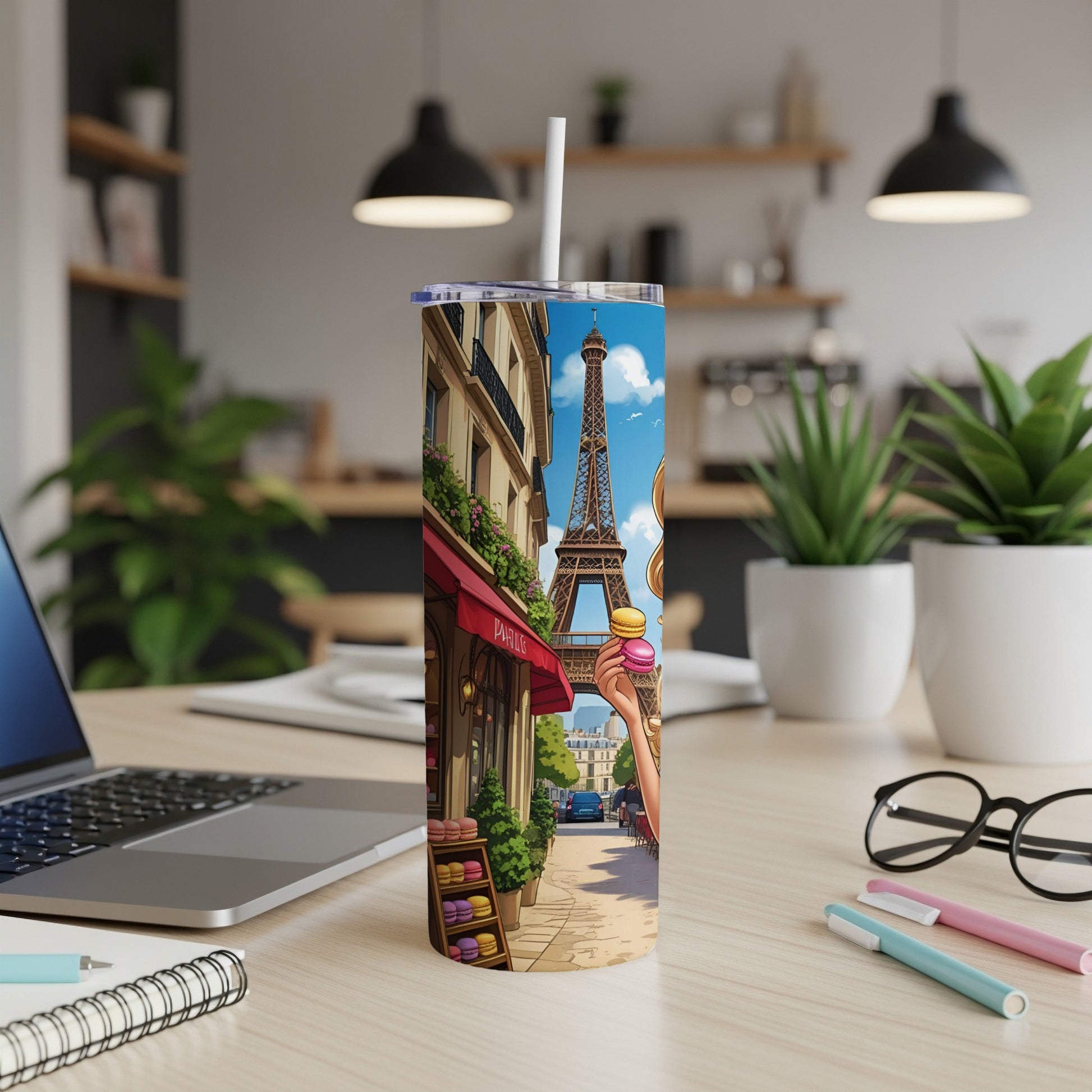 Parisian street scene with Eiffel Tower and macarons on a tumbler.