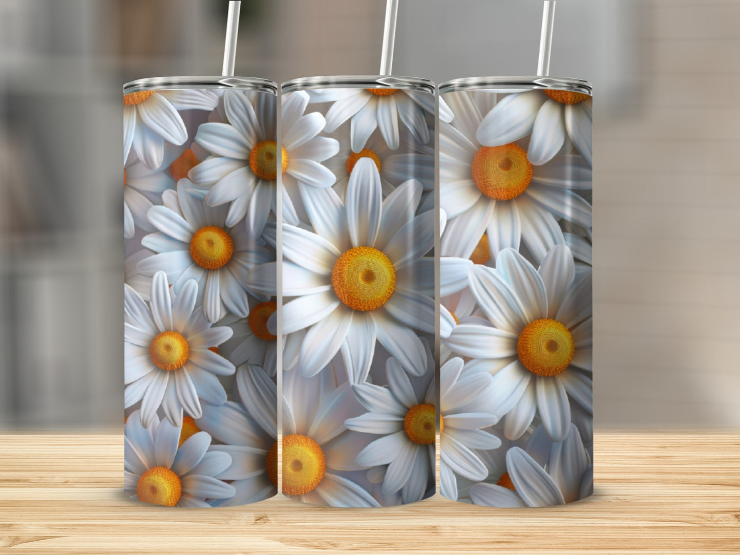 Three tumblers with a white daisy floral pattern.