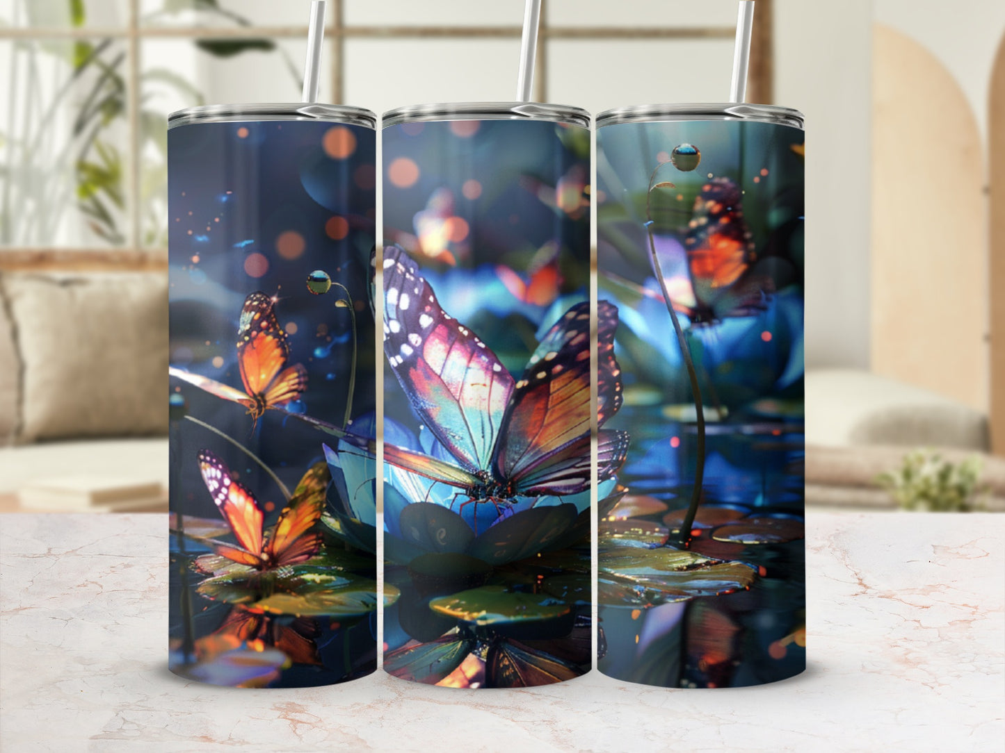 Three tumblers with colorful butterflies and glowing flowers on a dark watery surface.