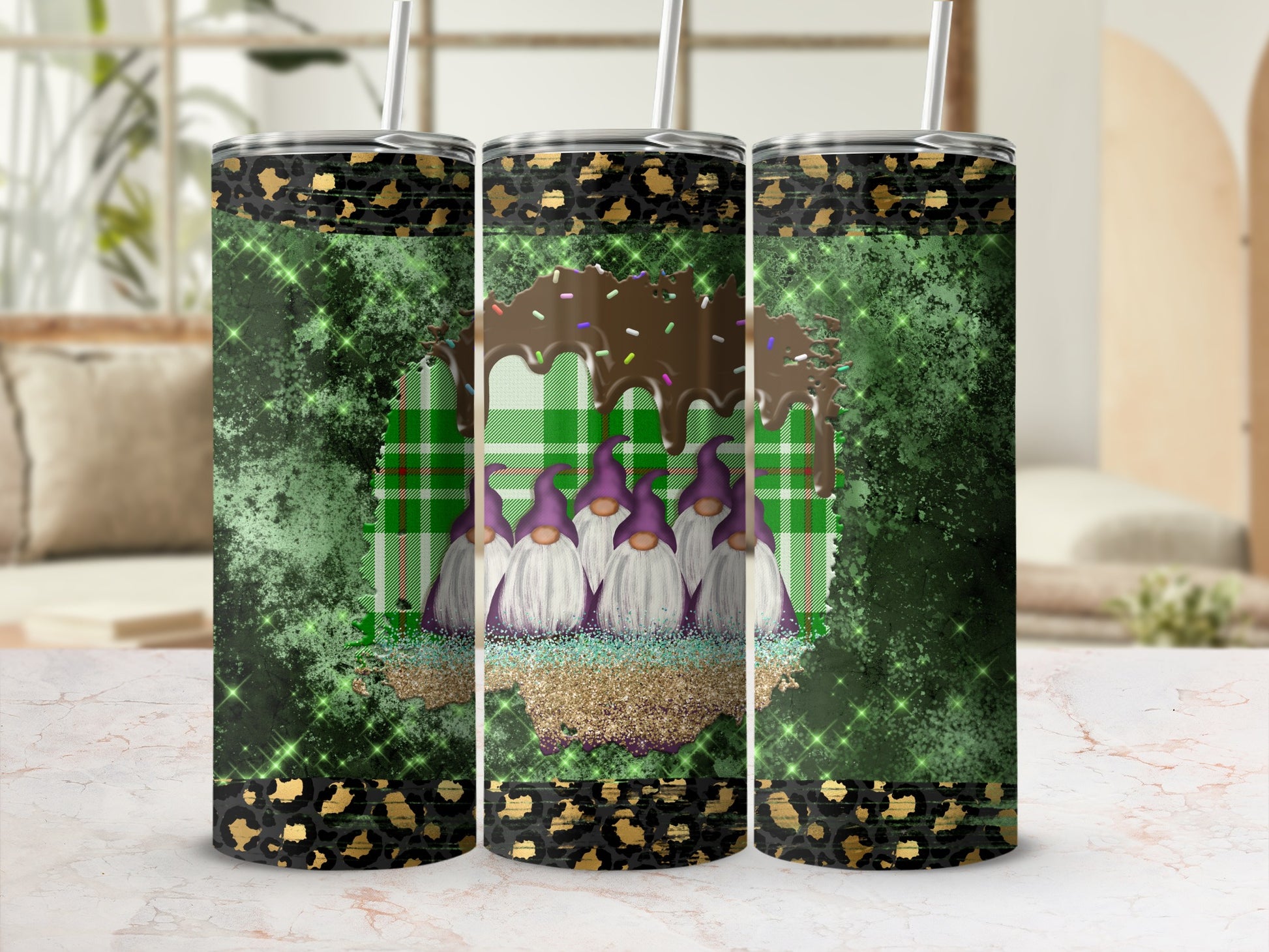Three green tumblers with purple gnomes and chocolate drizzle design.
