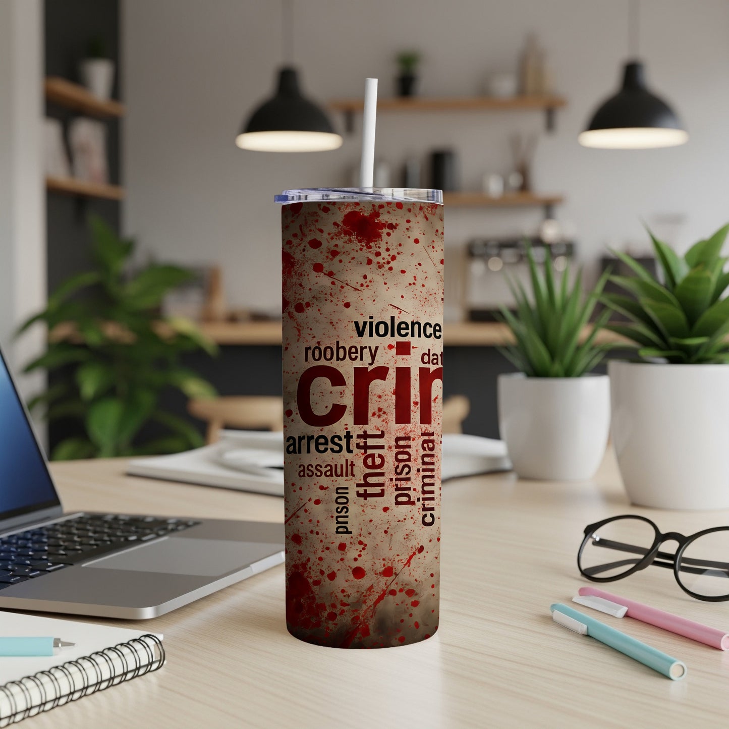 Tumbler with blood splatter and crime-related words.