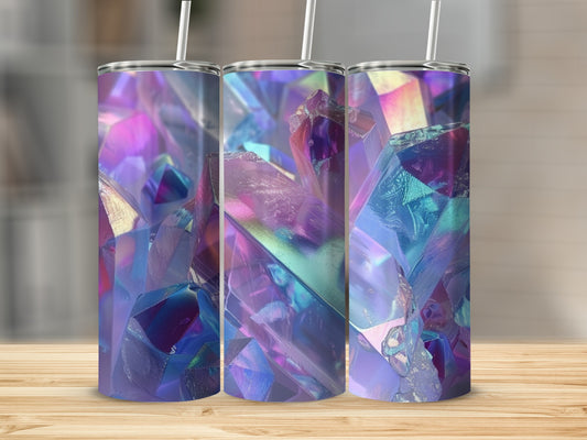 Triptych of iridescent crystal tumblers with straws, set on a wooden surface.