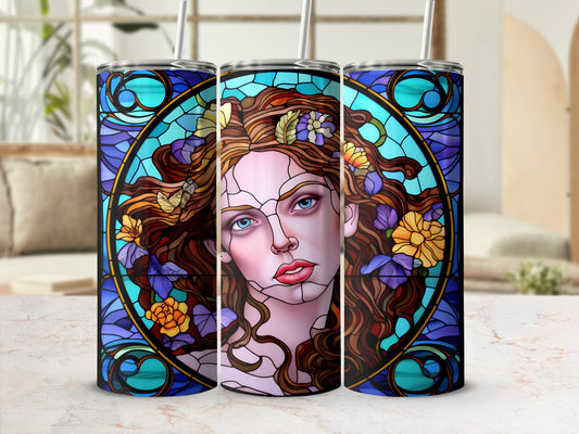 Stained glass tumbler featuring a woman's portrait with flowers and butterflies.