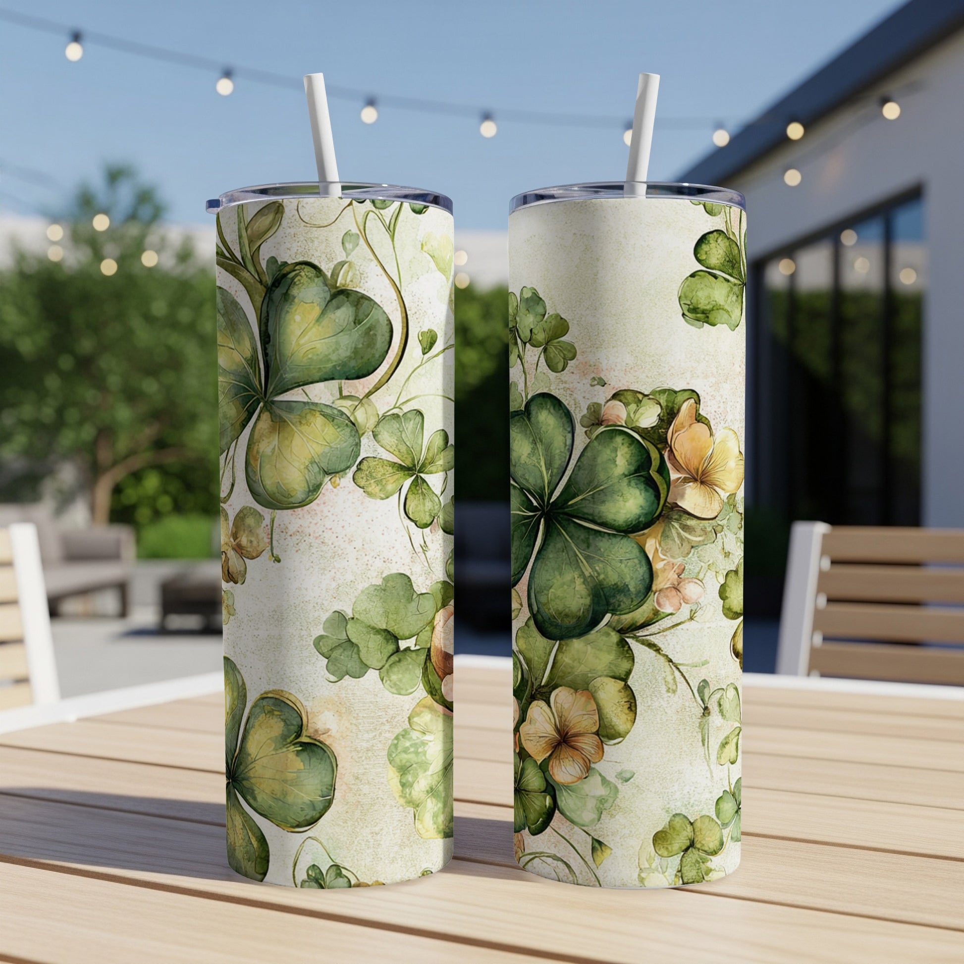 Two tumblers with a green clover and floral St. Patrick's Day pattern.