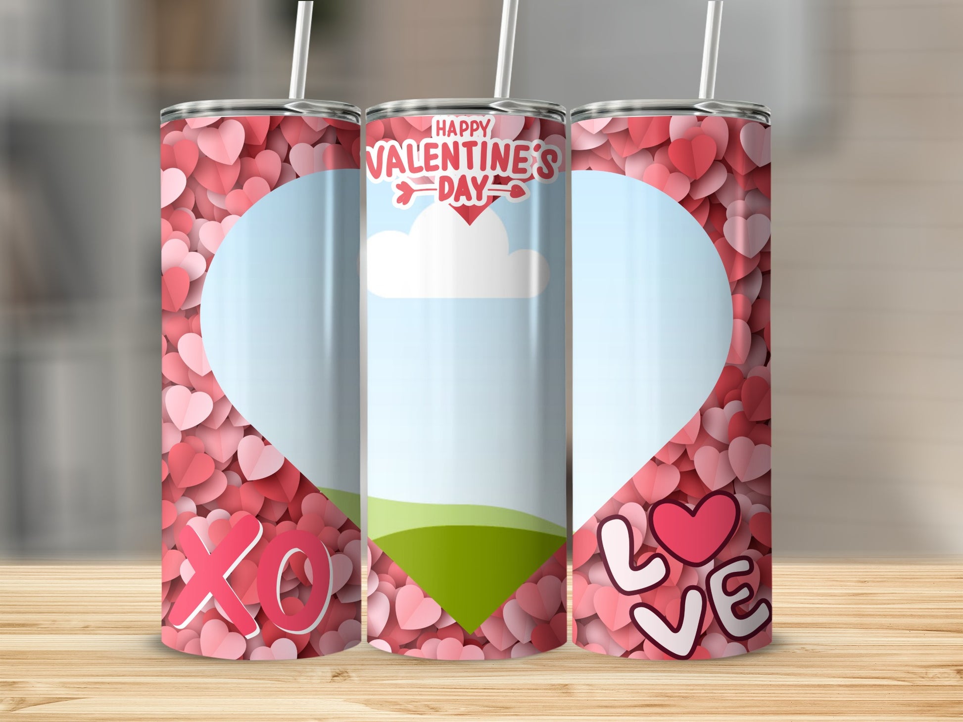 Three tumblers with Valentine's Day heart designs, "XO", and "LOVE".