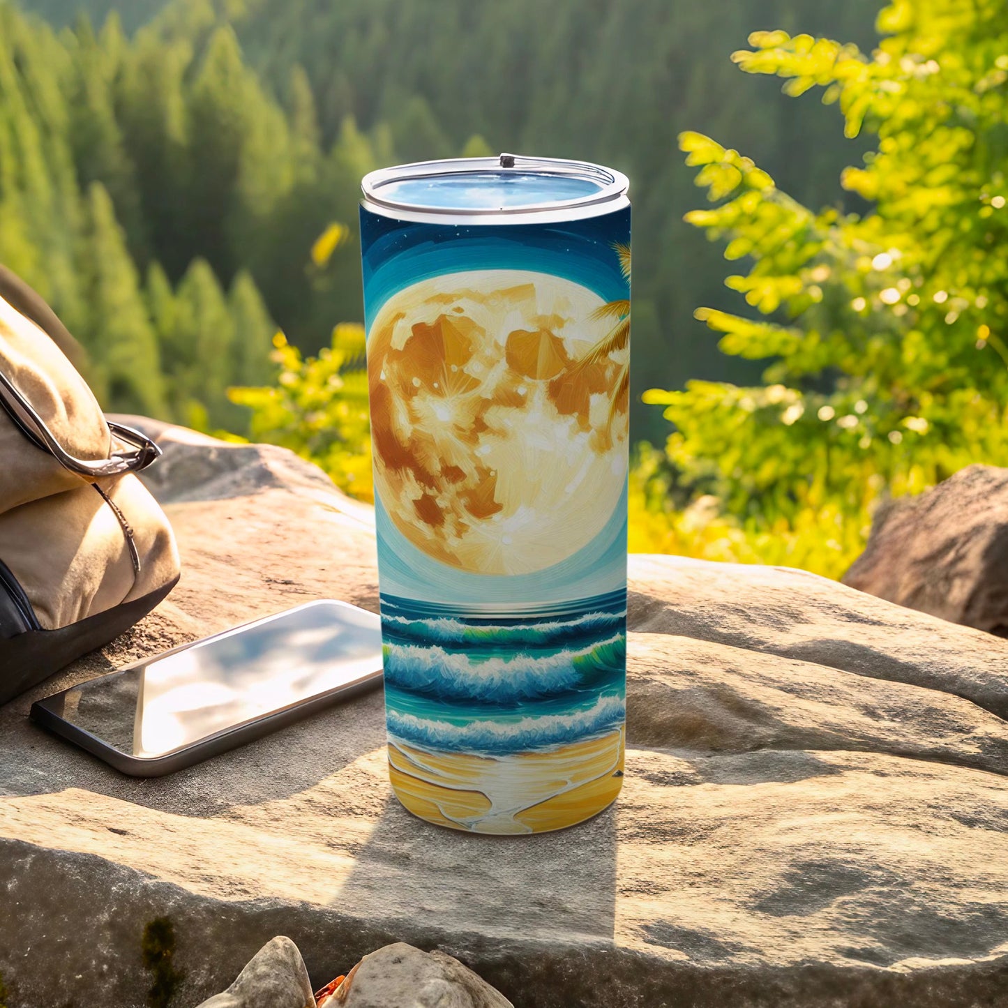 Full moon over ocean waves on a beach, printed on a silver tumbler.