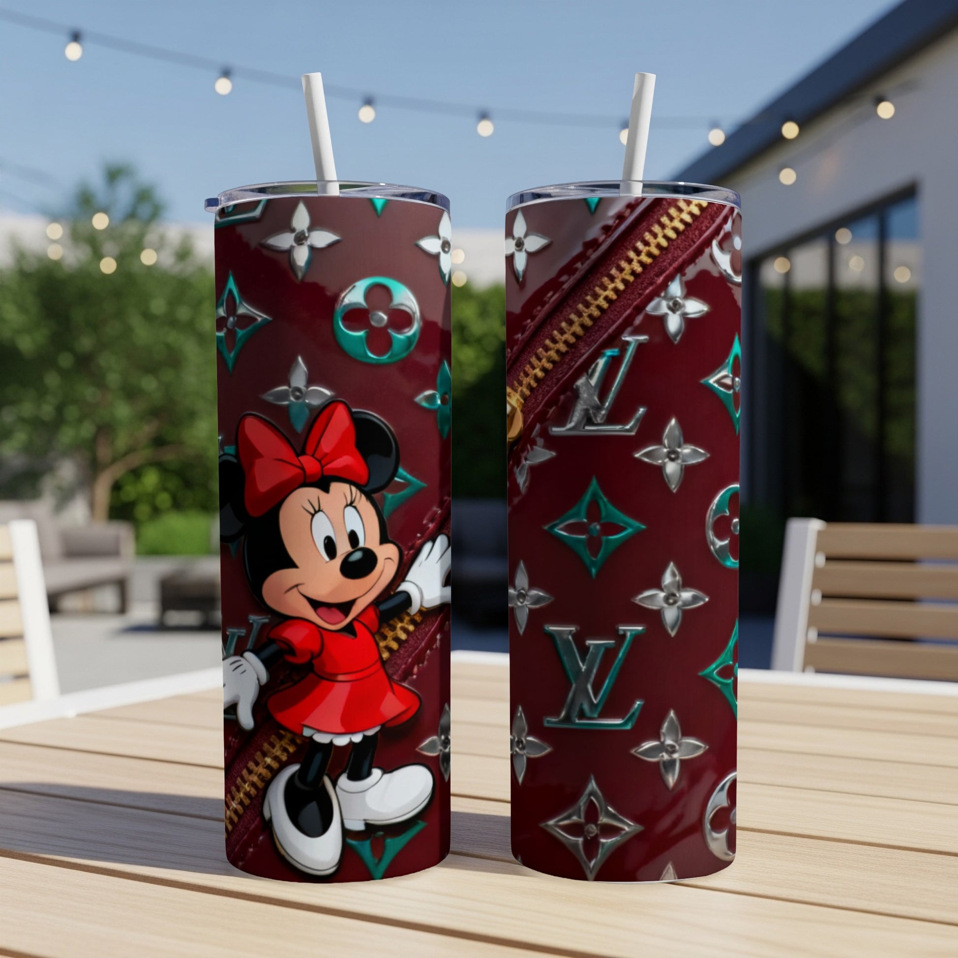Minnie Mouse on a burgundy tumbler with LV-inspired pattern and zipper detail.