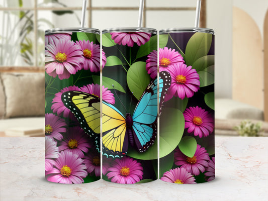 Pink daisies surround a colorful butterfly on a metal tumbler.