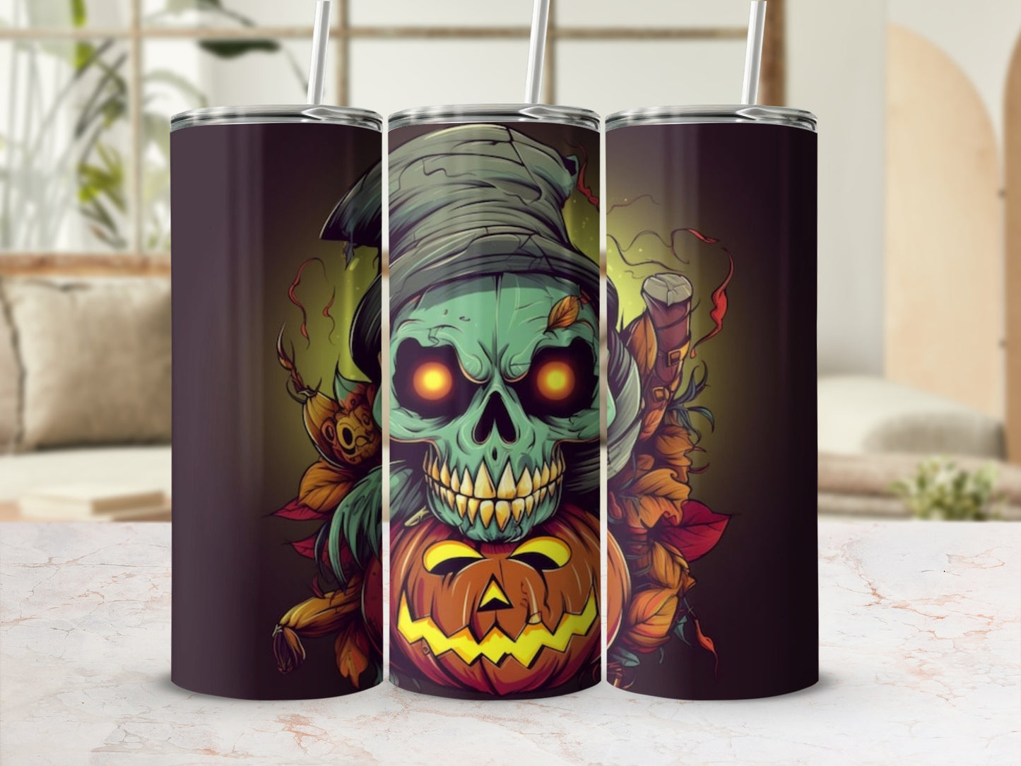 Tumbler with green skull wearing witch hat atop pumpkin, surrounded by autumn leaves.