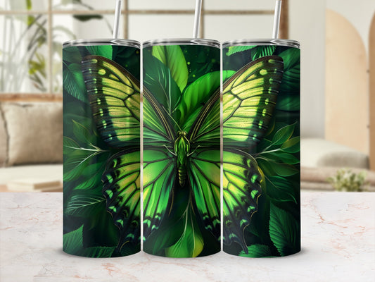 Green butterfly with intricate wing patterns on a tumbler.