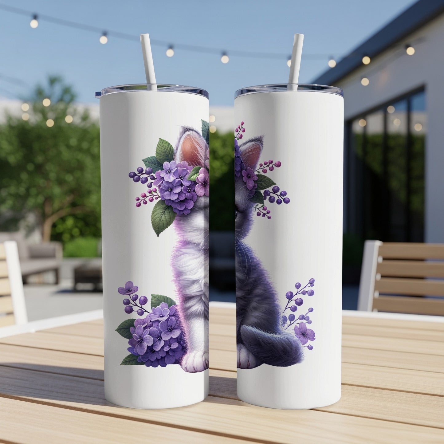 Two white tumblers featuring a grey cat adorned with purple flowers.