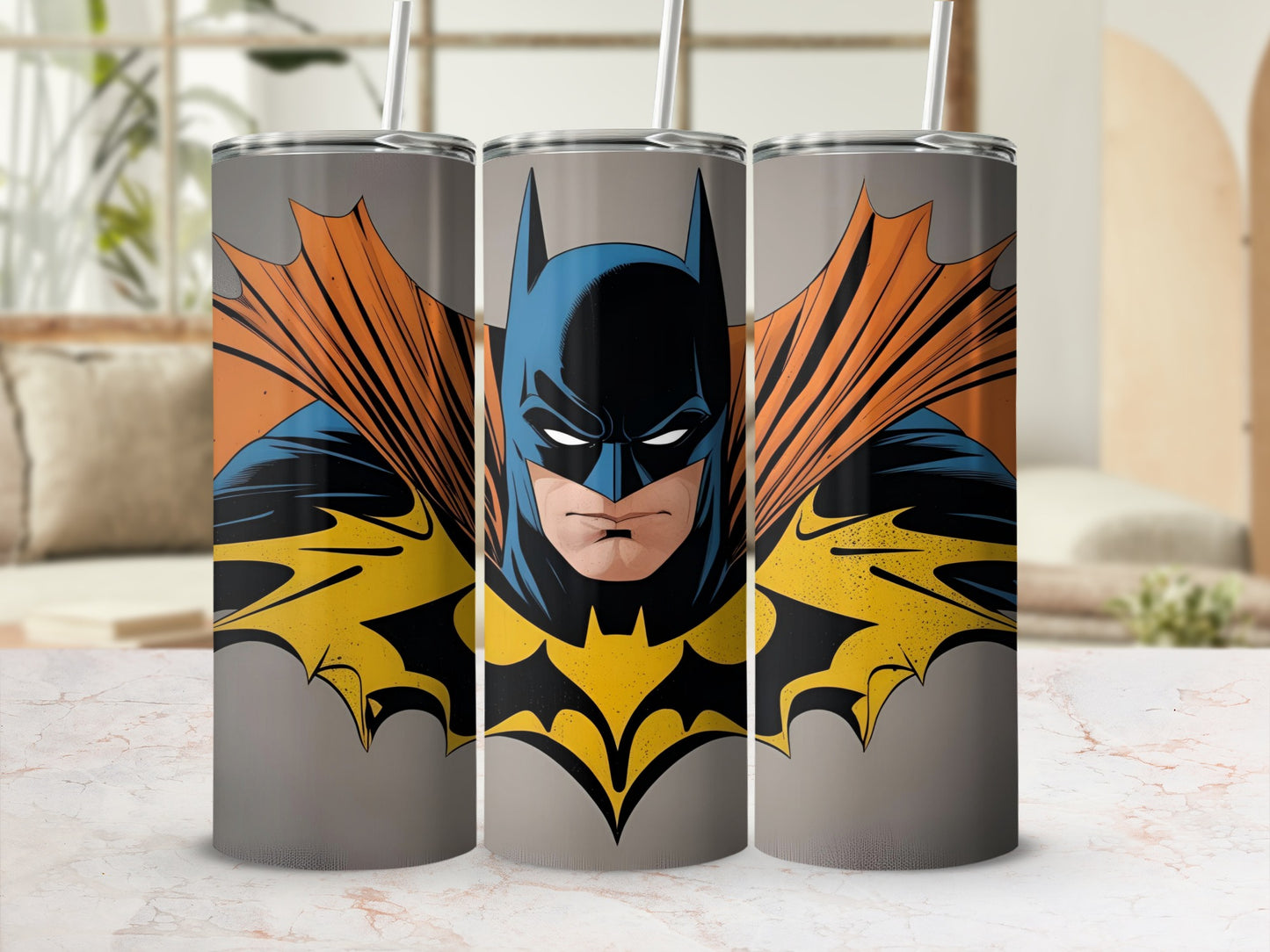 Batman's iconic cowl and cape on three stainless steel tumblers.