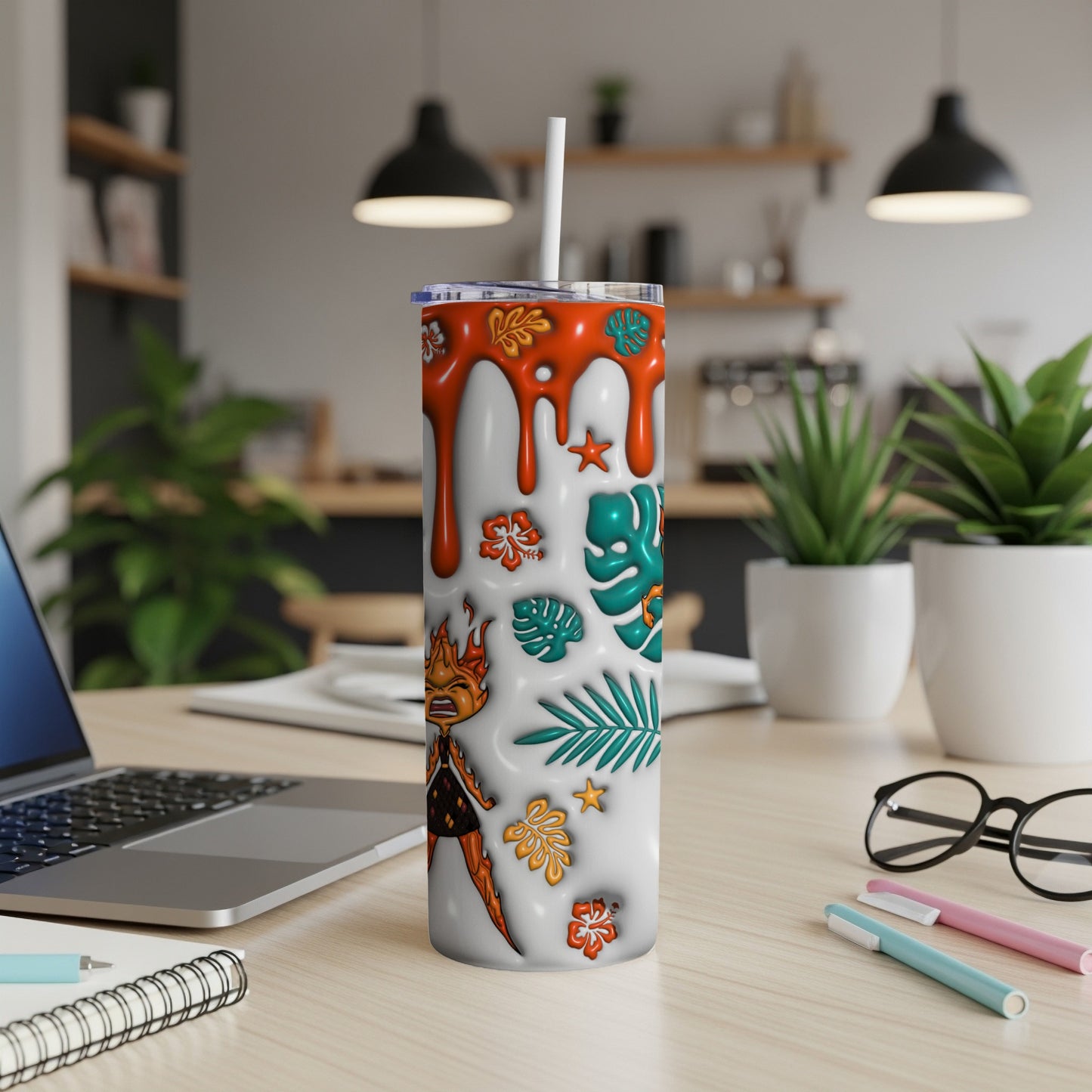 White tumbler with tropical designs and a cartoon character illustration.