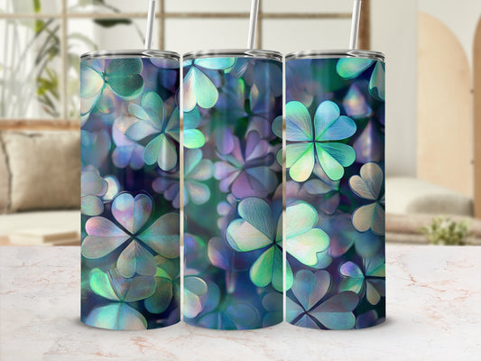 Three tumblers with a holographic clover pattern and straws.