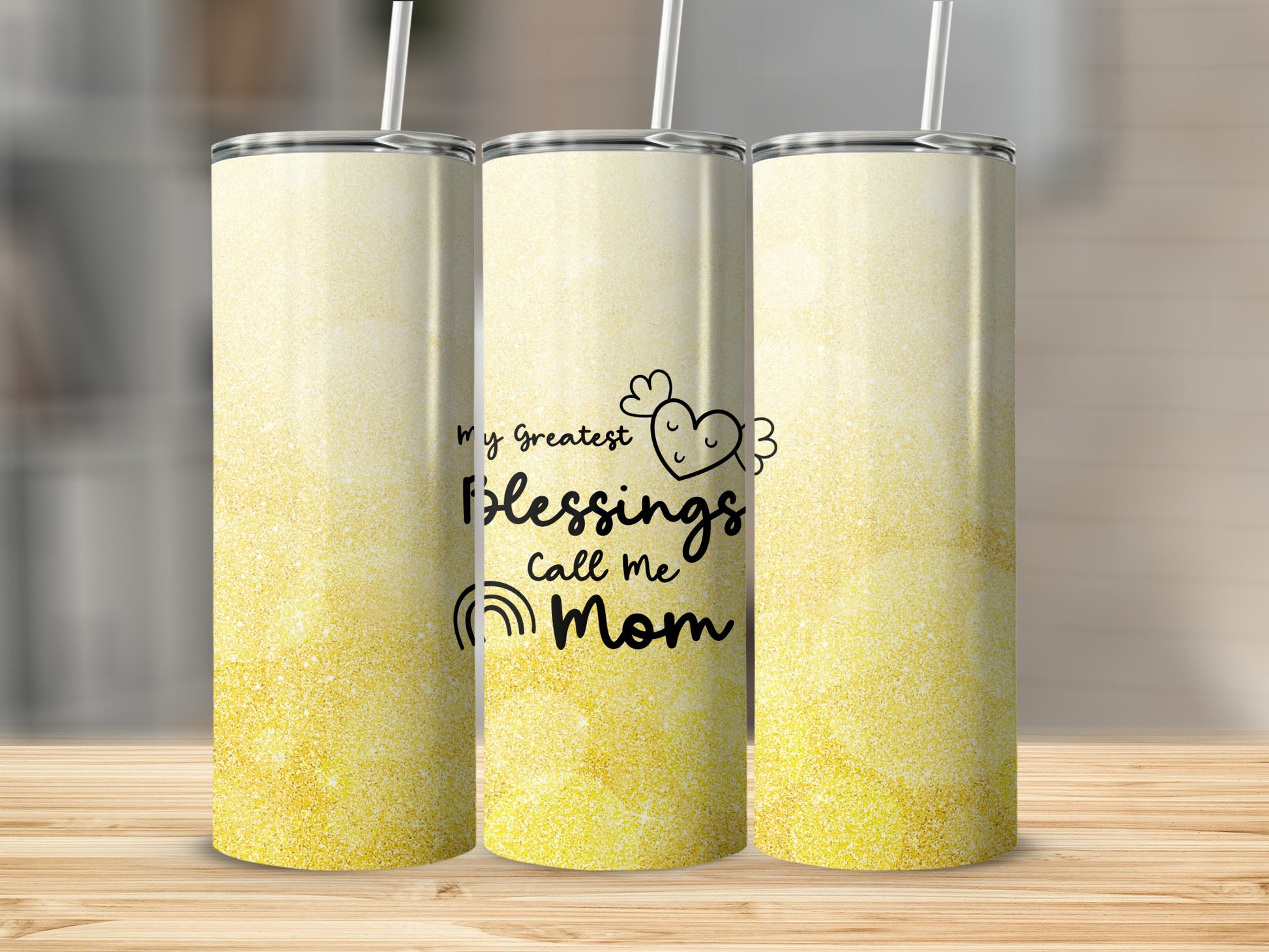 Glittering yellow tumbler with "My Greatest Blessings Call Me Mom" text.
