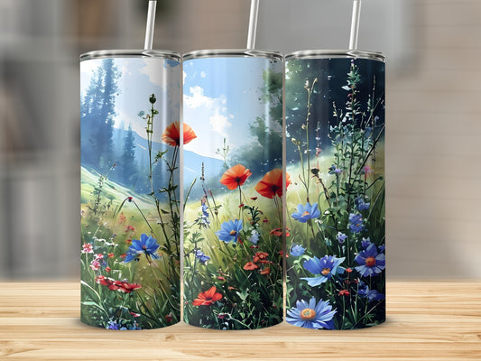 Three tumblers featuring a colorful wildflower meadow with a forest in the background.